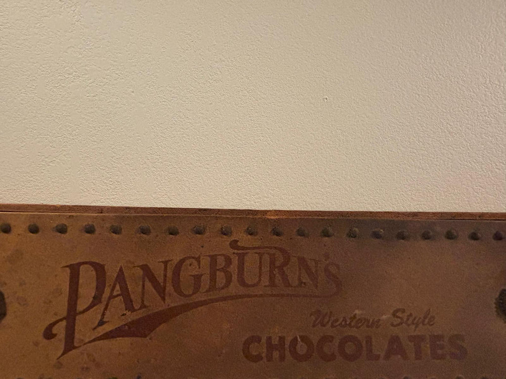 Rare Pangburn’s Chocolates double-sided leather trade sign, Fort Worth, Texas, circa 1915–1925.