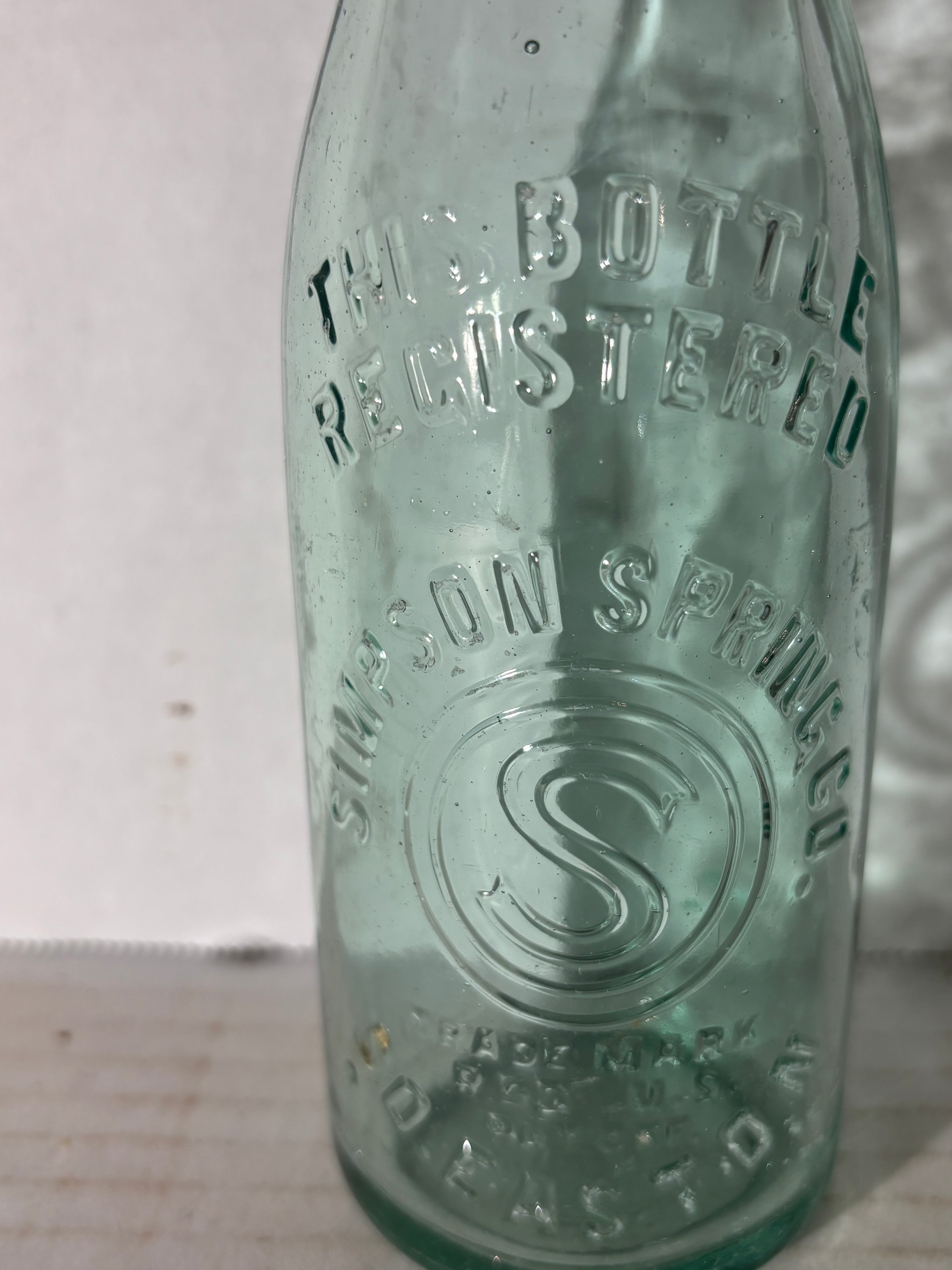 Simpson Spring Company Embossed Spring Water Bottle