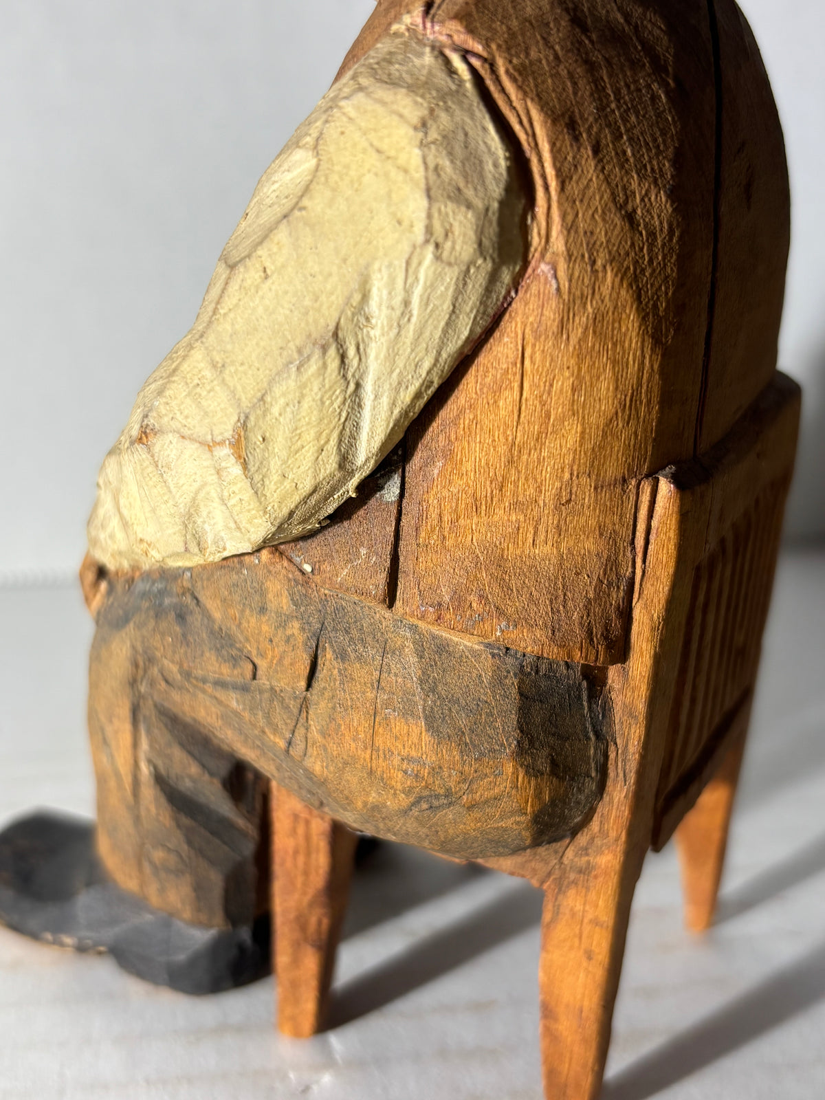 WONDERFULLY EXPRESSIVE CARVED & PAINTED FOLK PORTRAIT OF A SEATED GENTLEMAN