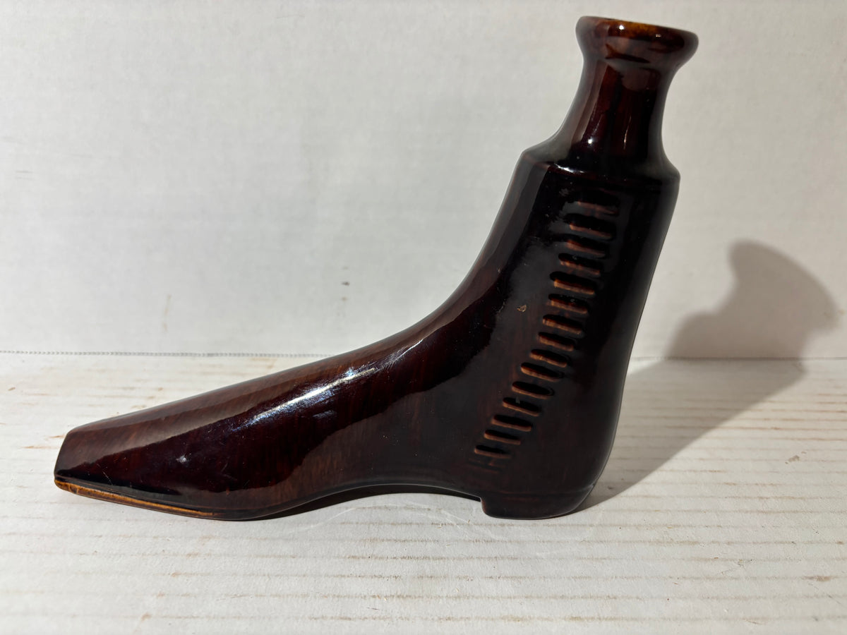 Rare American Rockingham-Glazed Shoe Form Spirit Flask (Bennington Type) American, circa 1845–1860