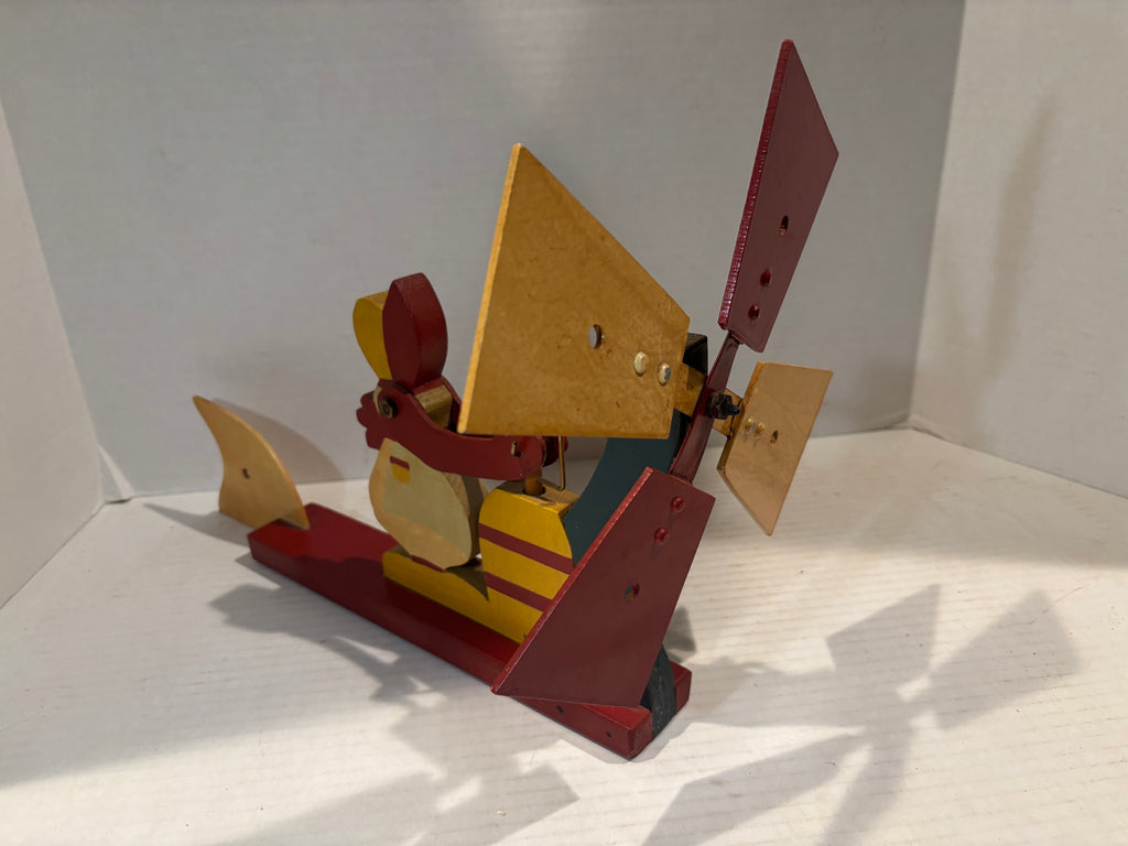 American Carved and Painted Folk Art Whirligig of a Woman Churning Butter, circa 1960–1970.