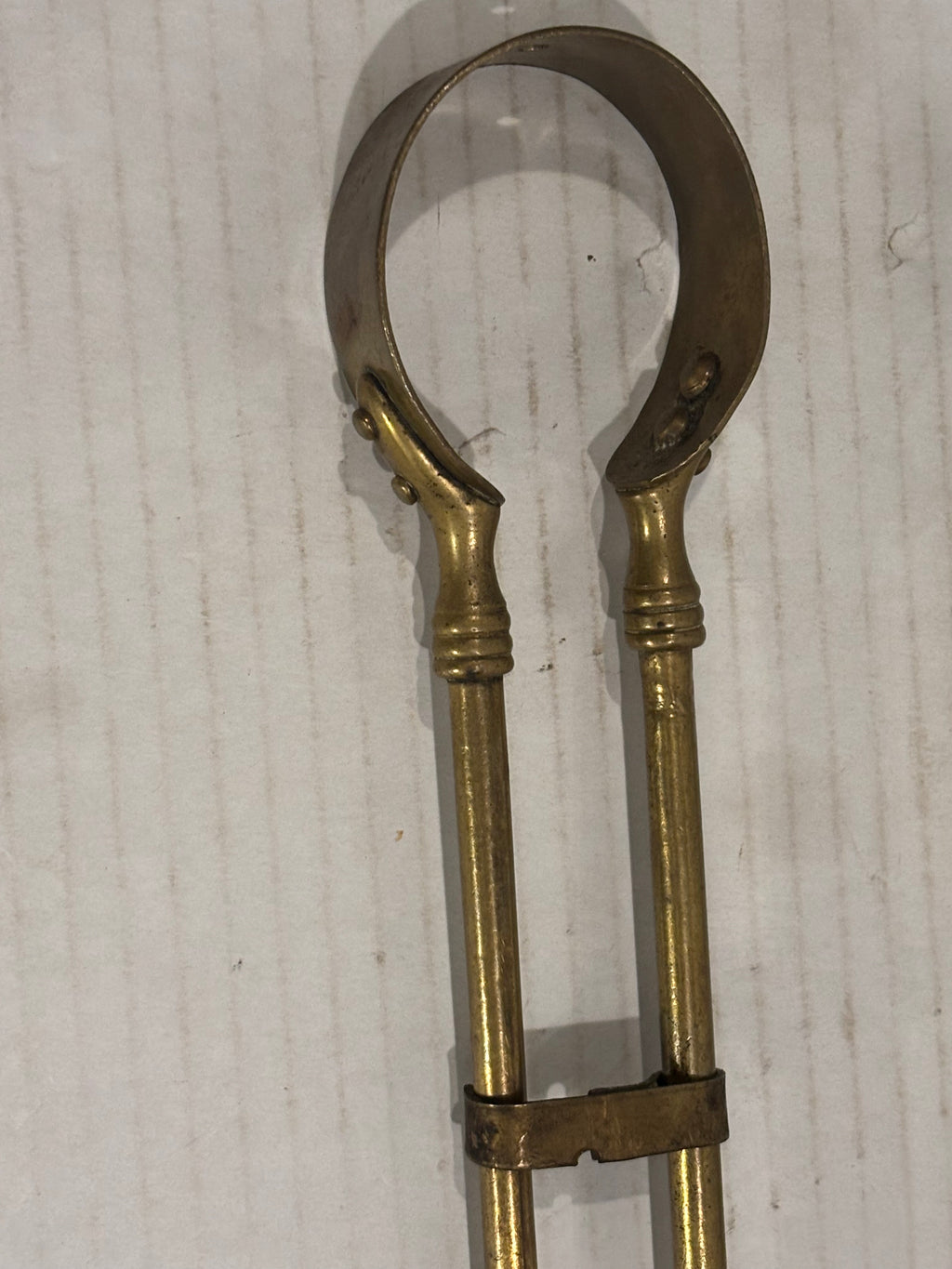 TWO RELATED GEORGIAN BRASS & IRON EMBER OR PIPE TONGS WITH HAND-FORM TERMINALS