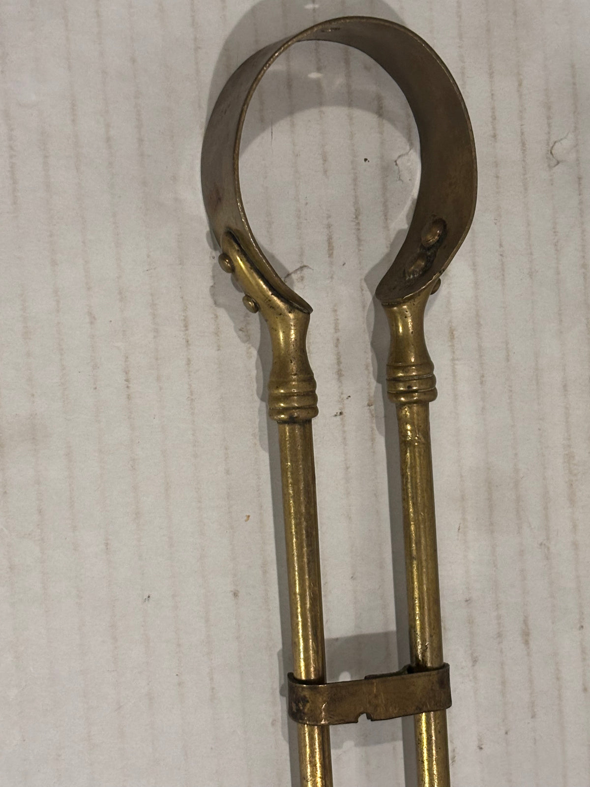 TWO RELATED GEORGIAN BRASS & IRON EMBER OR PIPE TONGS WITH HAND-FORM TERMINALS