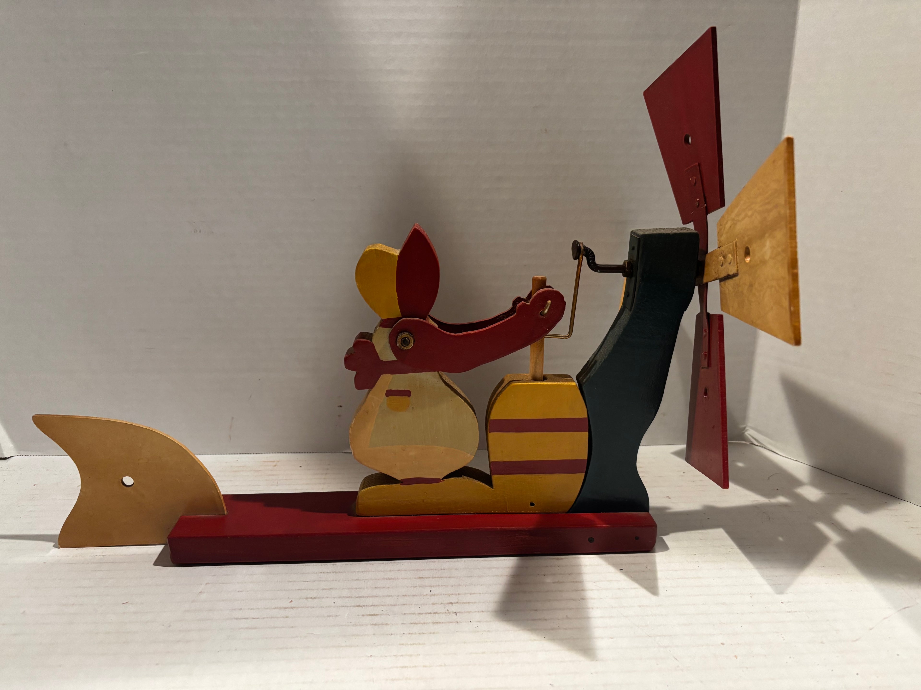 American Carved and Painted Folk Art Whirligig of a Woman Churning Butter, circa 1960–1970.