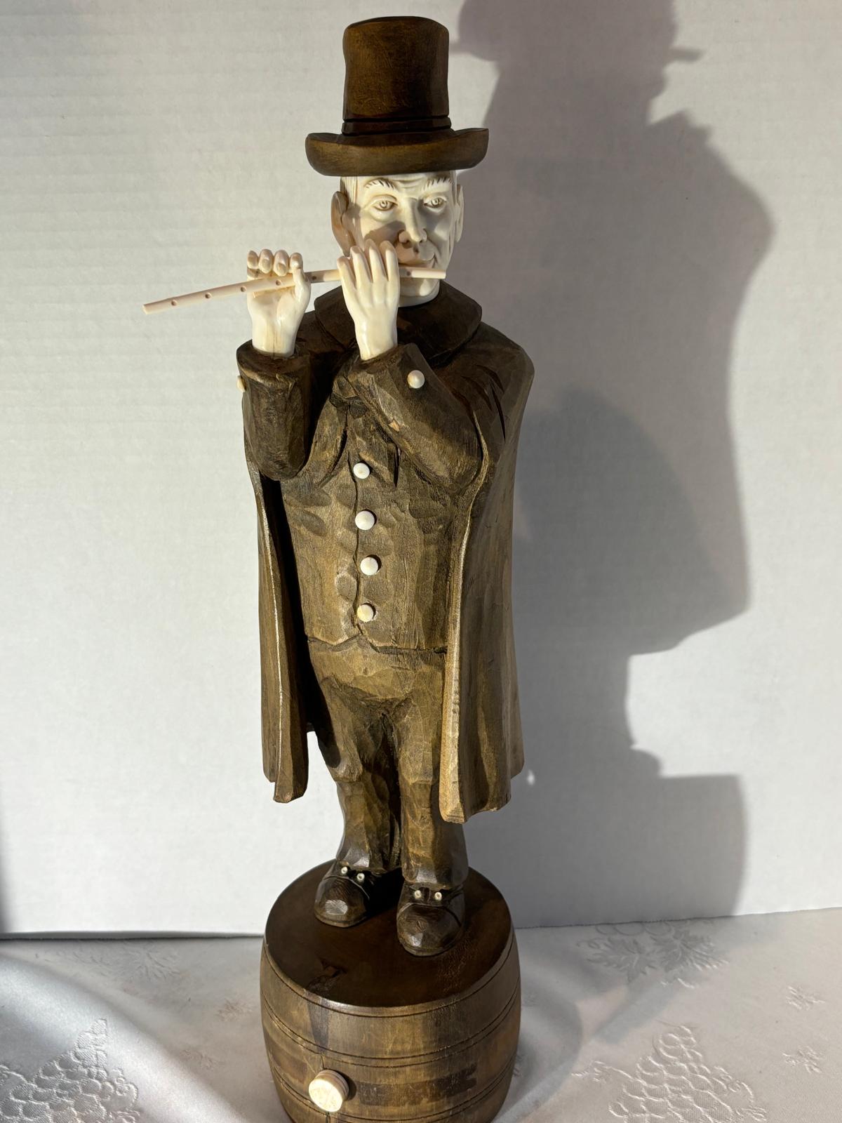 Carved Wood and Bovine Bone Figural Sculpture of a Flute-Playing Gentleman