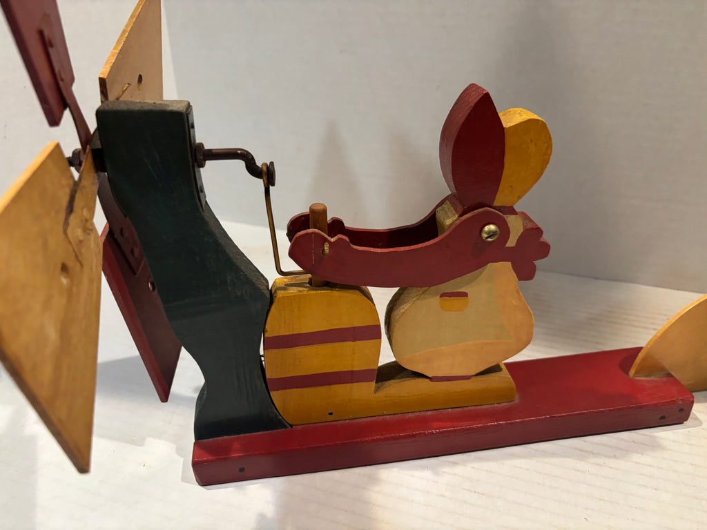 American Carved and Painted Folk Art Whirligig of a Woman Churning Butter, circa 1960–1970.