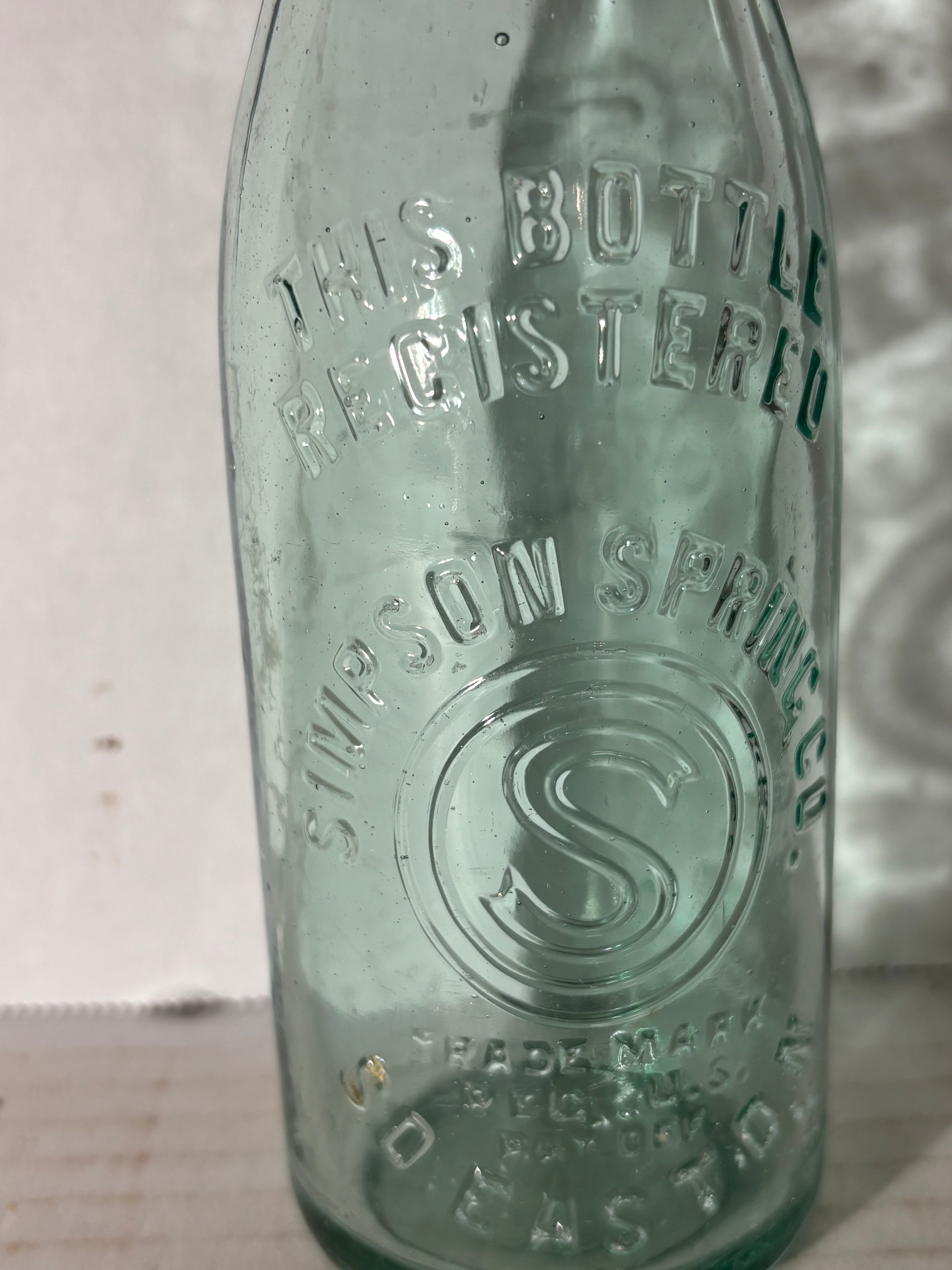 Simpson Spring Company Embossed Spring Water Bottle