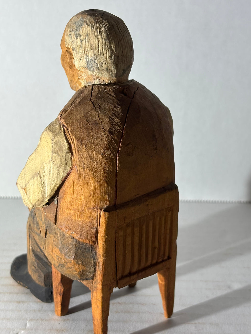 WONDERFULLY EXPRESSIVE CARVED & PAINTED FOLK PORTRAIT OF A SEATED GENTLEMAN