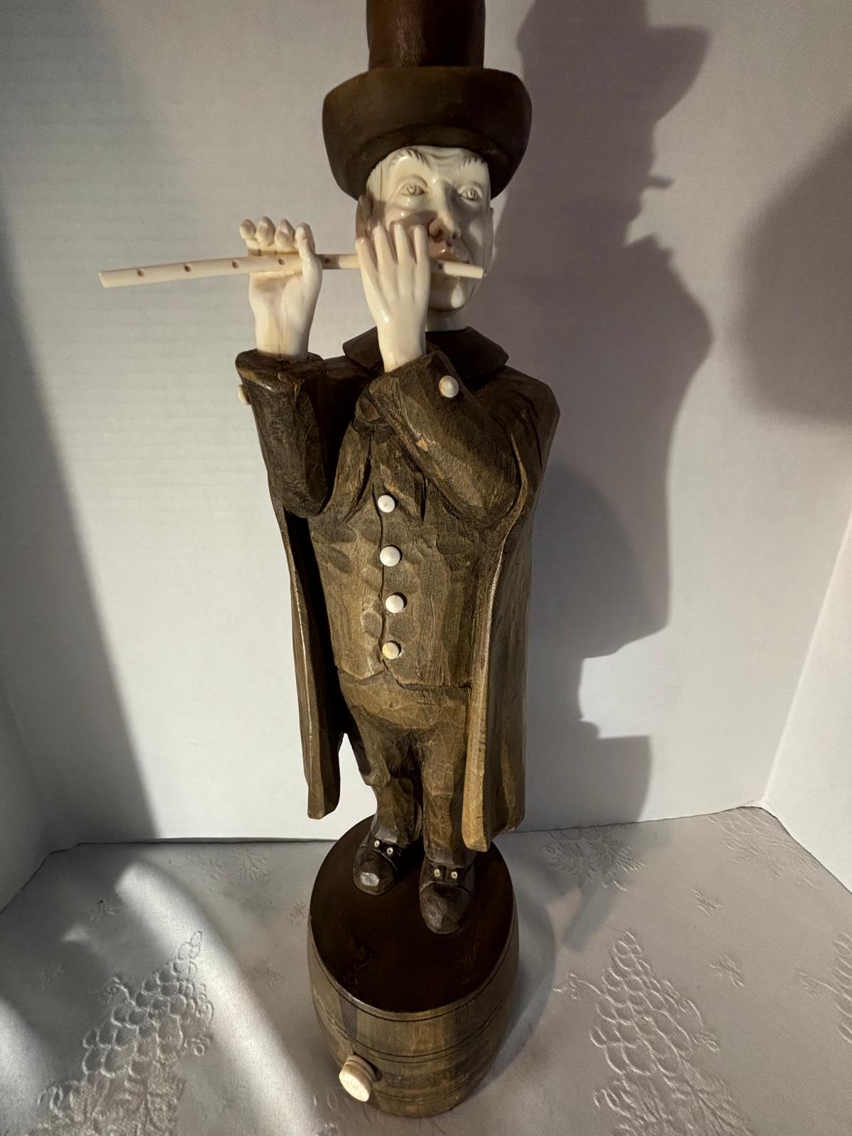 Carved Wood and Bovine Bone Figural Sculpture of a Flute-Playing Gentleman