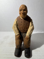 WONDERFULLY EXPRESSIVE CARVED & PAINTED FOLK PORTRAIT OF A SEATED GENTLEMAN