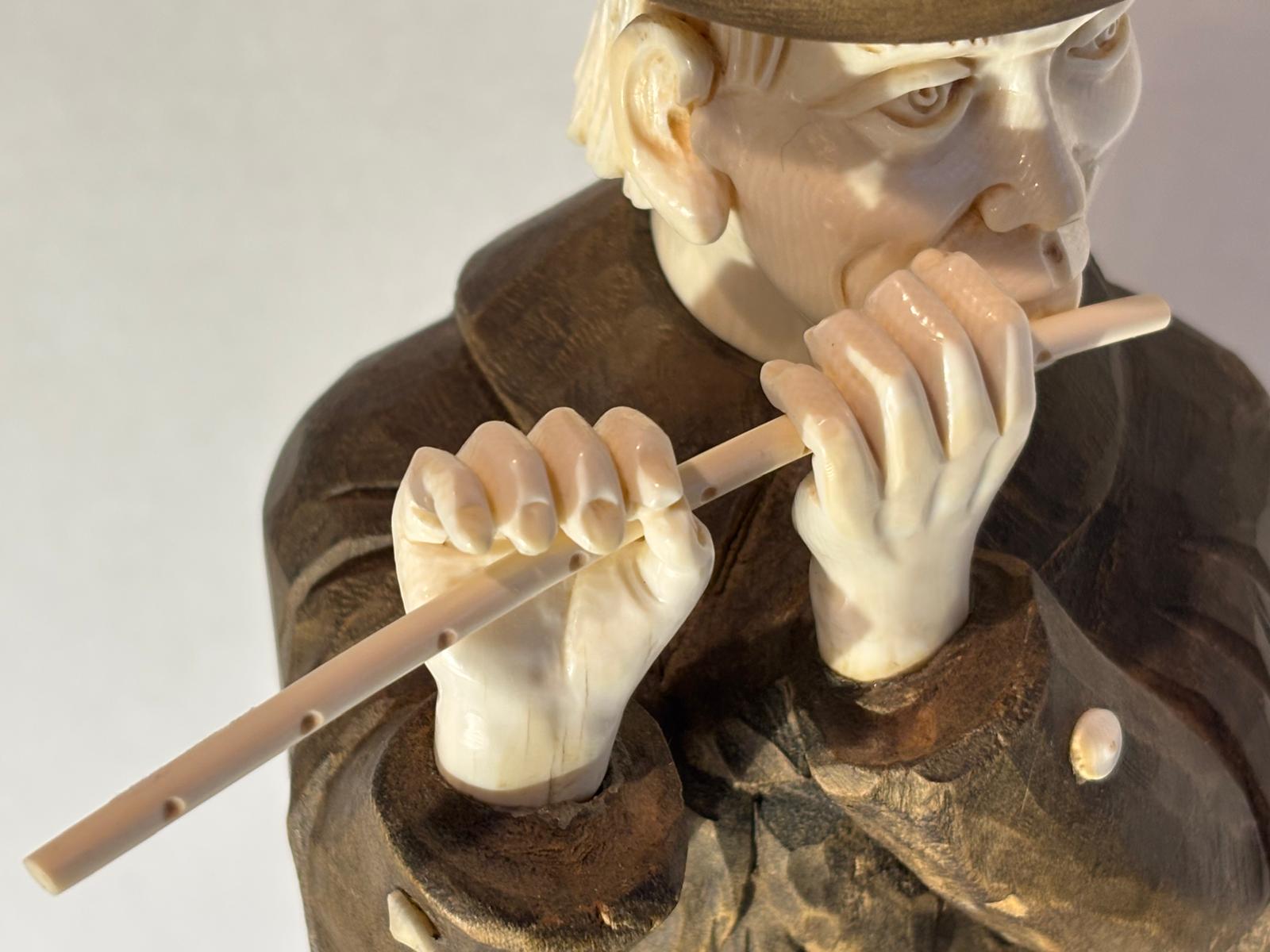 Carved Wood and Bovine Bone Figural Sculpture of a Flute-Playing Gentleman