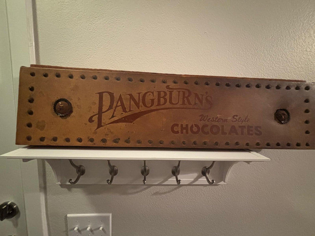 Rare Pangburn’s Chocolates double-sided leather trade sign, Fort Worth, Texas, circa 1915–1925.