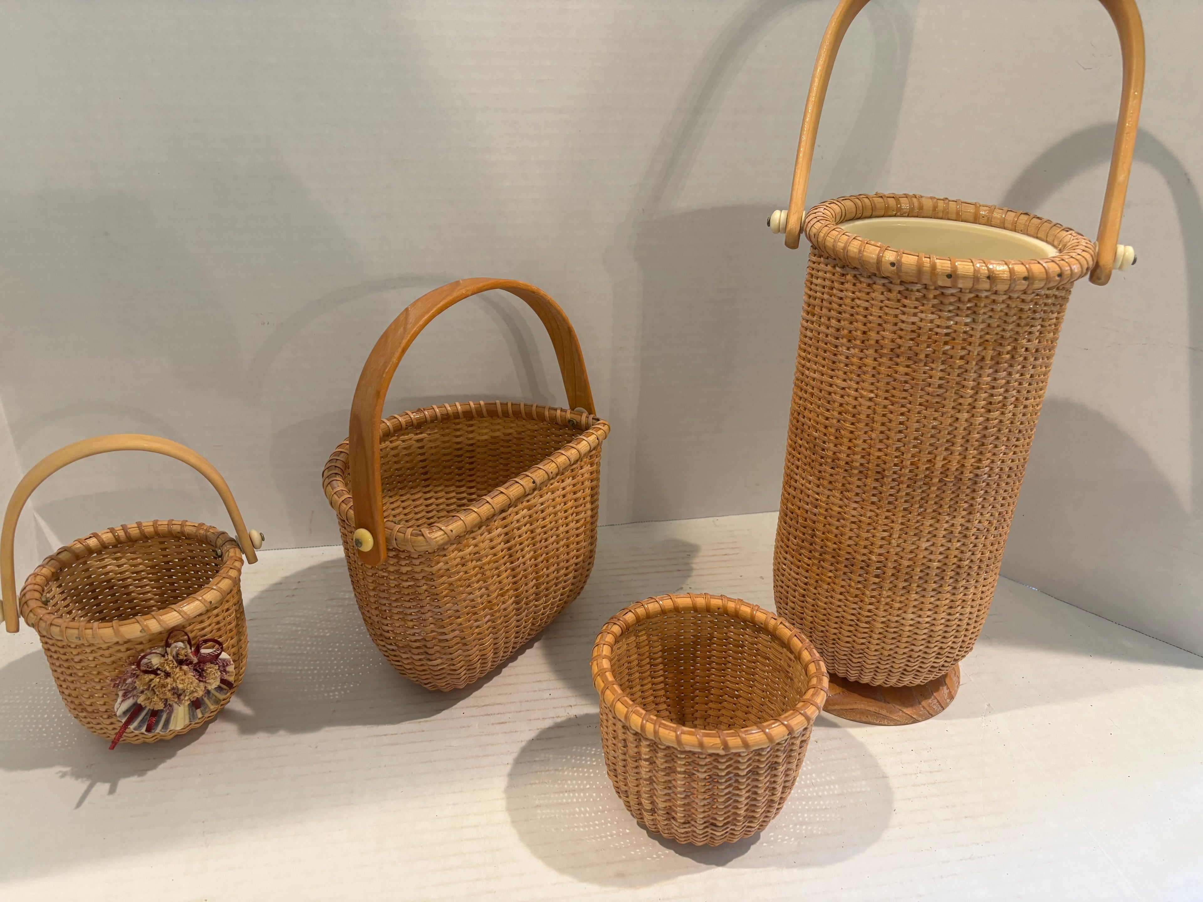 Collection of Four Handwoven Nantucket-Style Baskets Cape Cod, Massachusetts, late 20th century