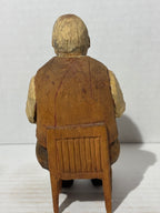 WONDERFULLY EXPRESSIVE CARVED & PAINTED FOLK PORTRAIT OF A SEATED GENTLEMAN