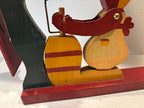 American Carved and Painted Folk Art Whirligig of a Woman Churning Butter, circa 1960–1970.