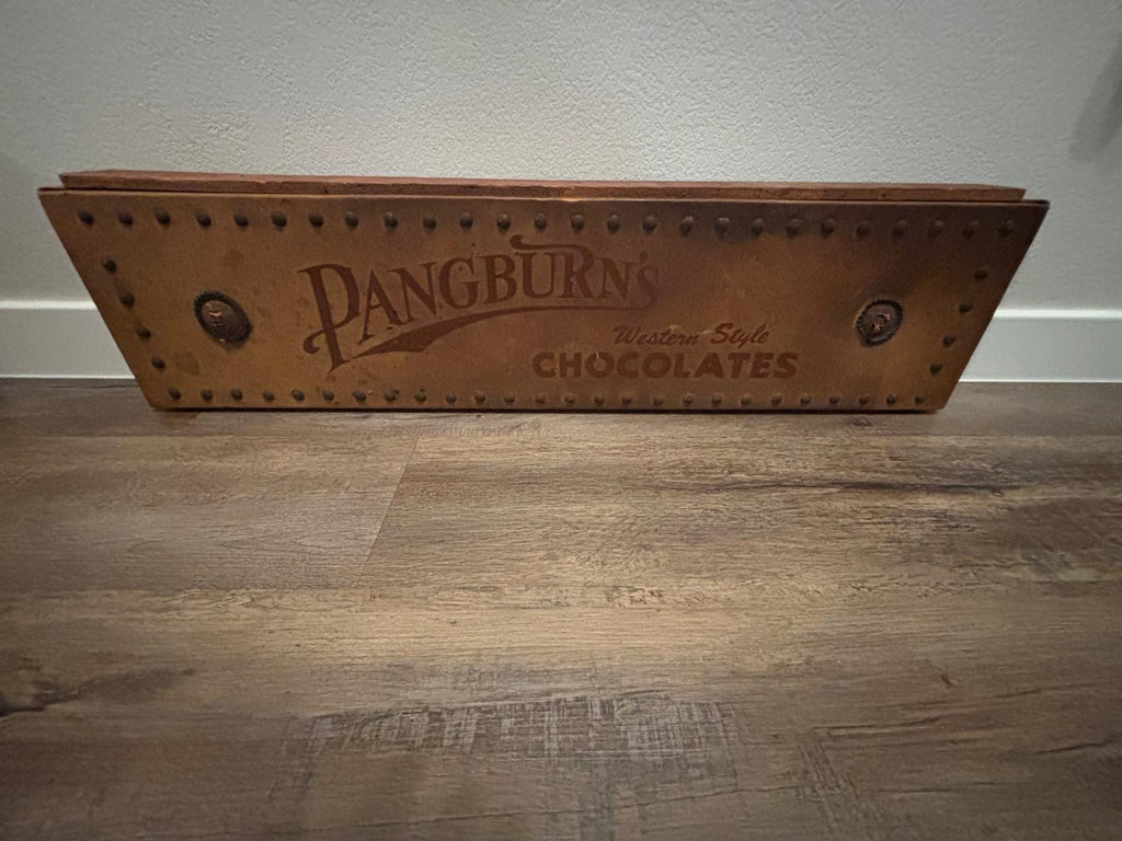 Rare Pangburn’s Chocolates double-sided leather trade sign, Fort Worth, Texas, circa 1915–1925.