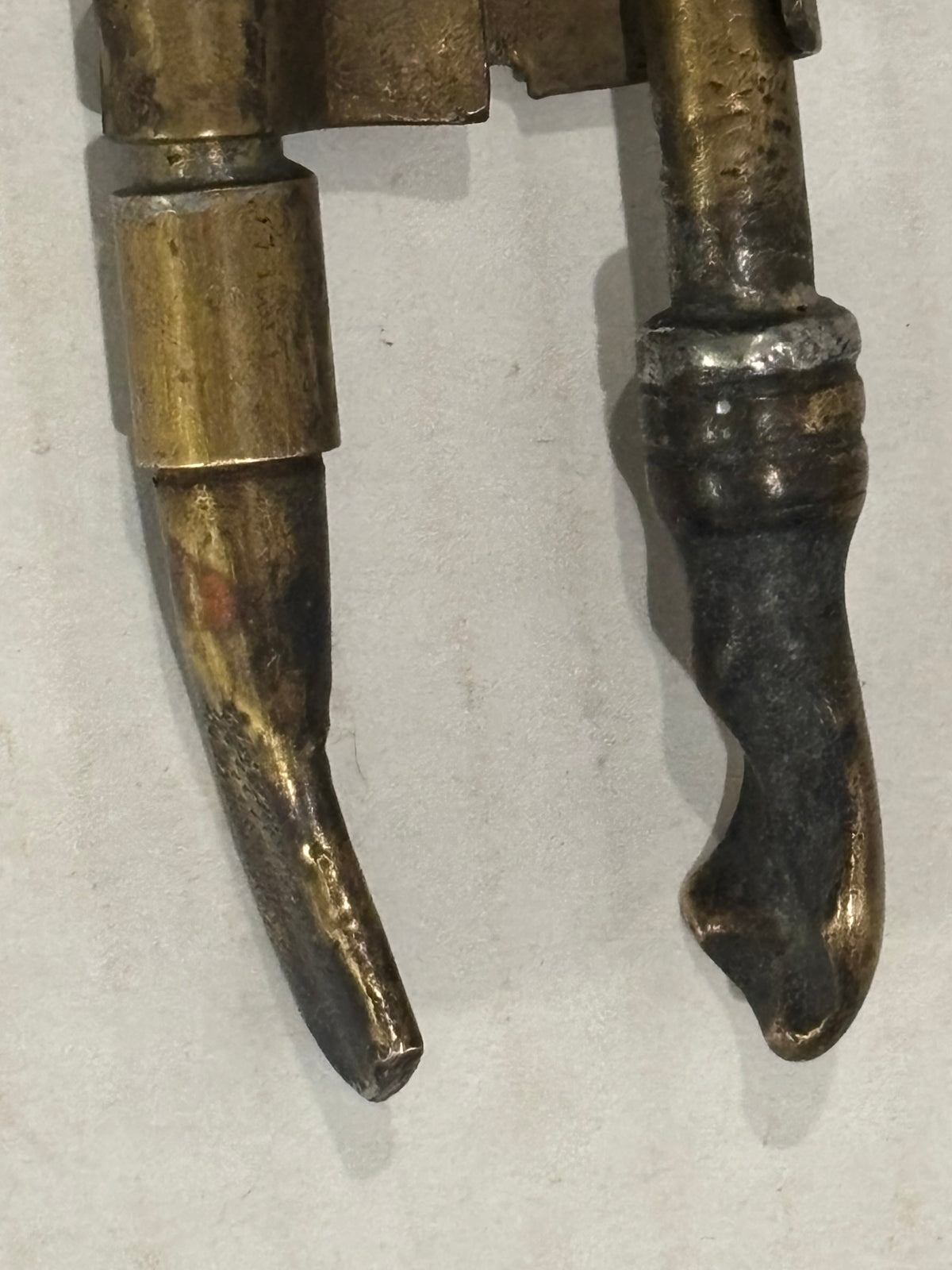 TWO RELATED GEORGIAN BRASS & IRON EMBER OR PIPE TONGS WITH HAND-FORM TERMINALS