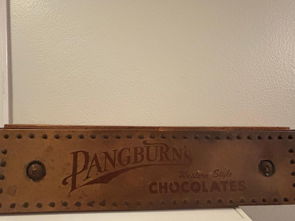 Rare Pangburn’s Chocolates double-sided leather trade sign, Fort Worth, Texas, circa 1915–1925.
