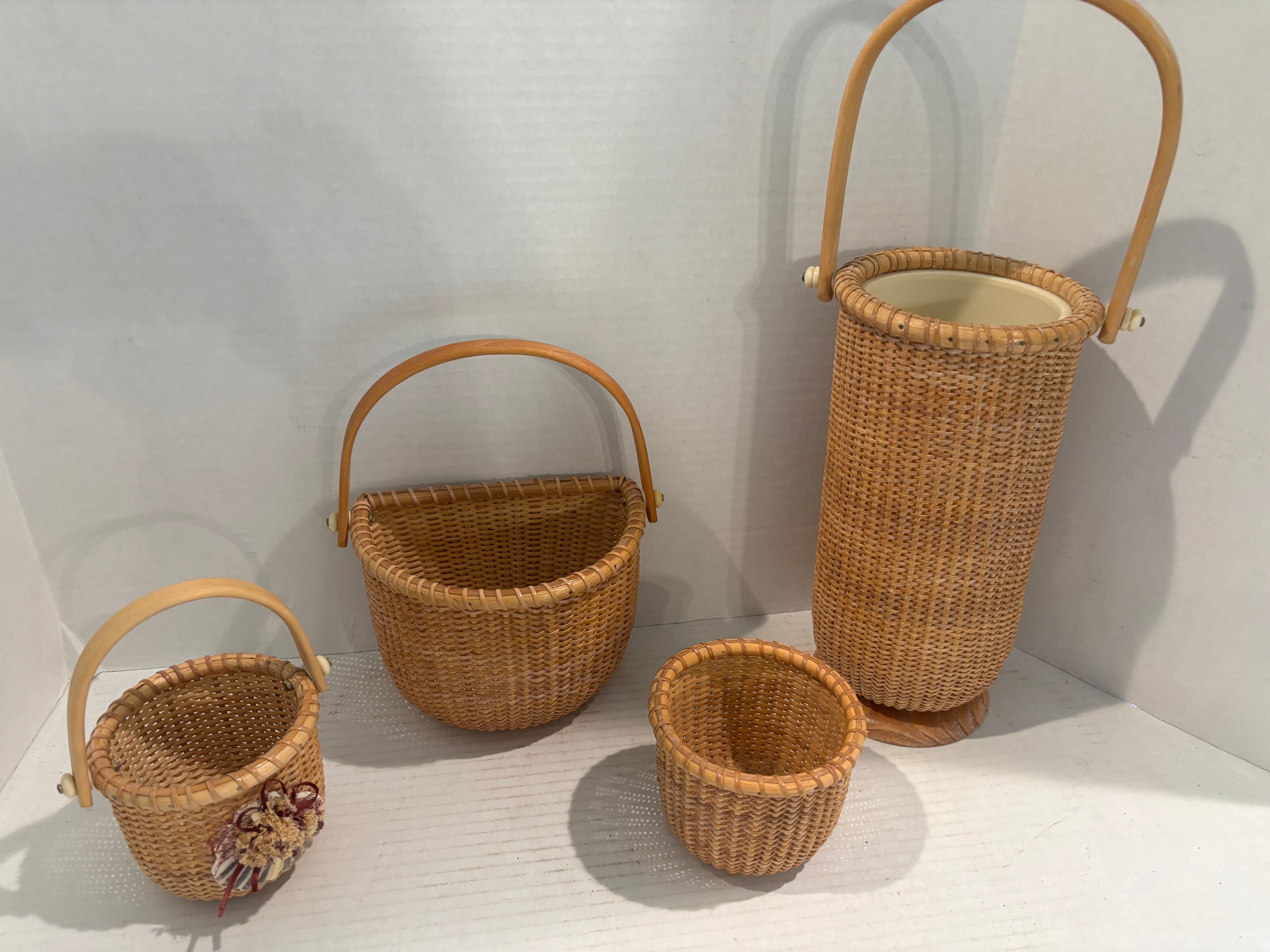 Collection of Four Handwoven Nantucket-Style Baskets Cape Cod, Massachusetts, late 20th century