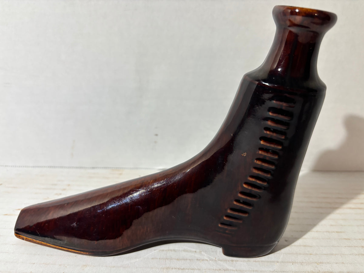 Rare American Rockingham-Glazed Shoe Form Spirit Flask (Bennington Type) American, circa 1845–1860