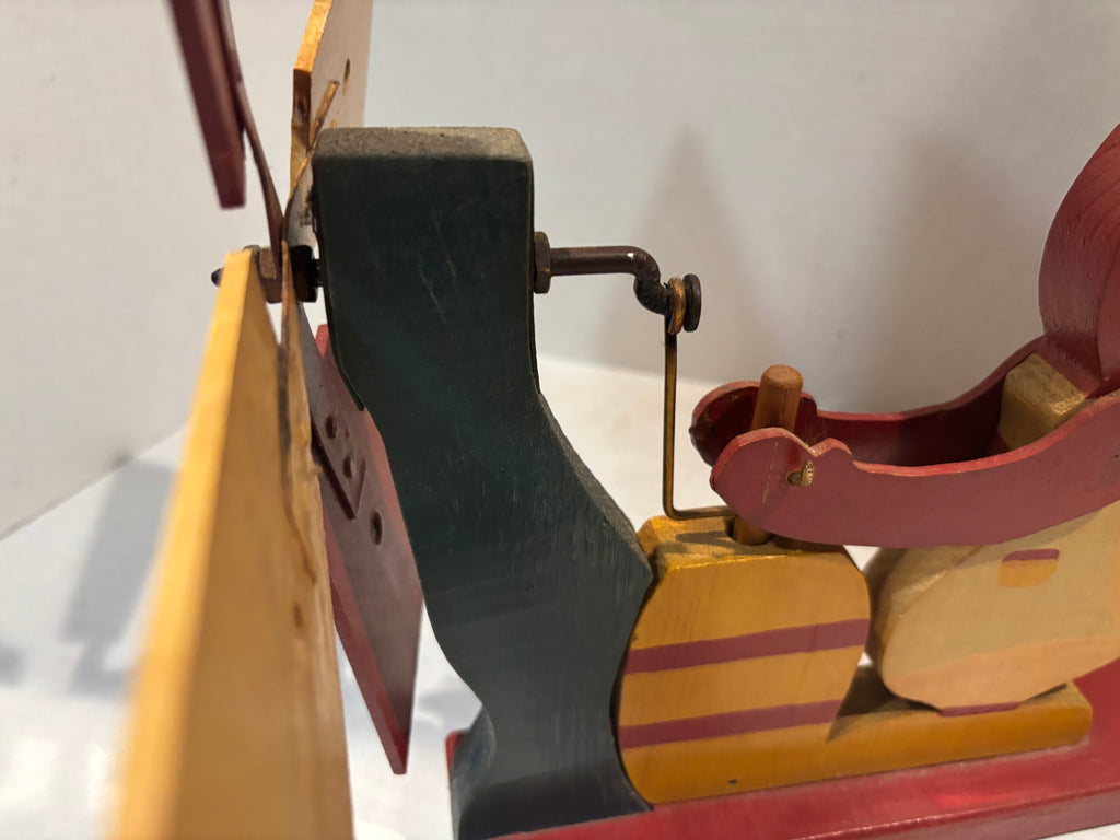 American Carved and Painted Folk Art Whirligig of a Woman Churning Butter, circa 1960–1970.