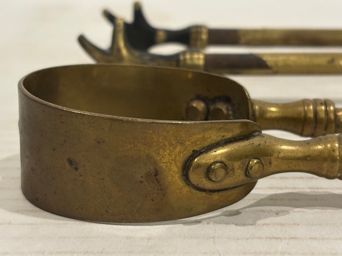 TWO RELATED GEORGIAN BRASS & IRON EMBER OR PIPE TONGS WITH HAND-FORM TERMINALS