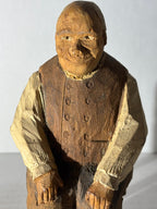 WONDERFULLY EXPRESSIVE CARVED & PAINTED FOLK PORTRAIT OF A SEATED GENTLEMAN