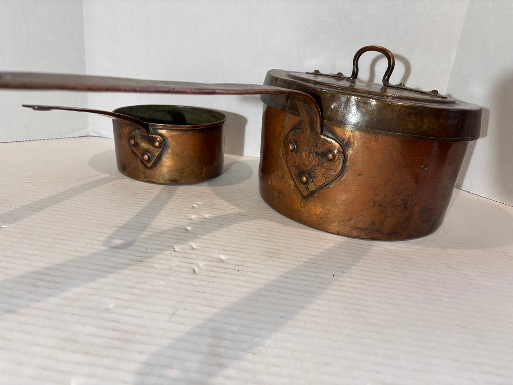 Exceptional Pair of Early French Dovetailed Copper Saucepans with Heart-Shaped Handle Mounts