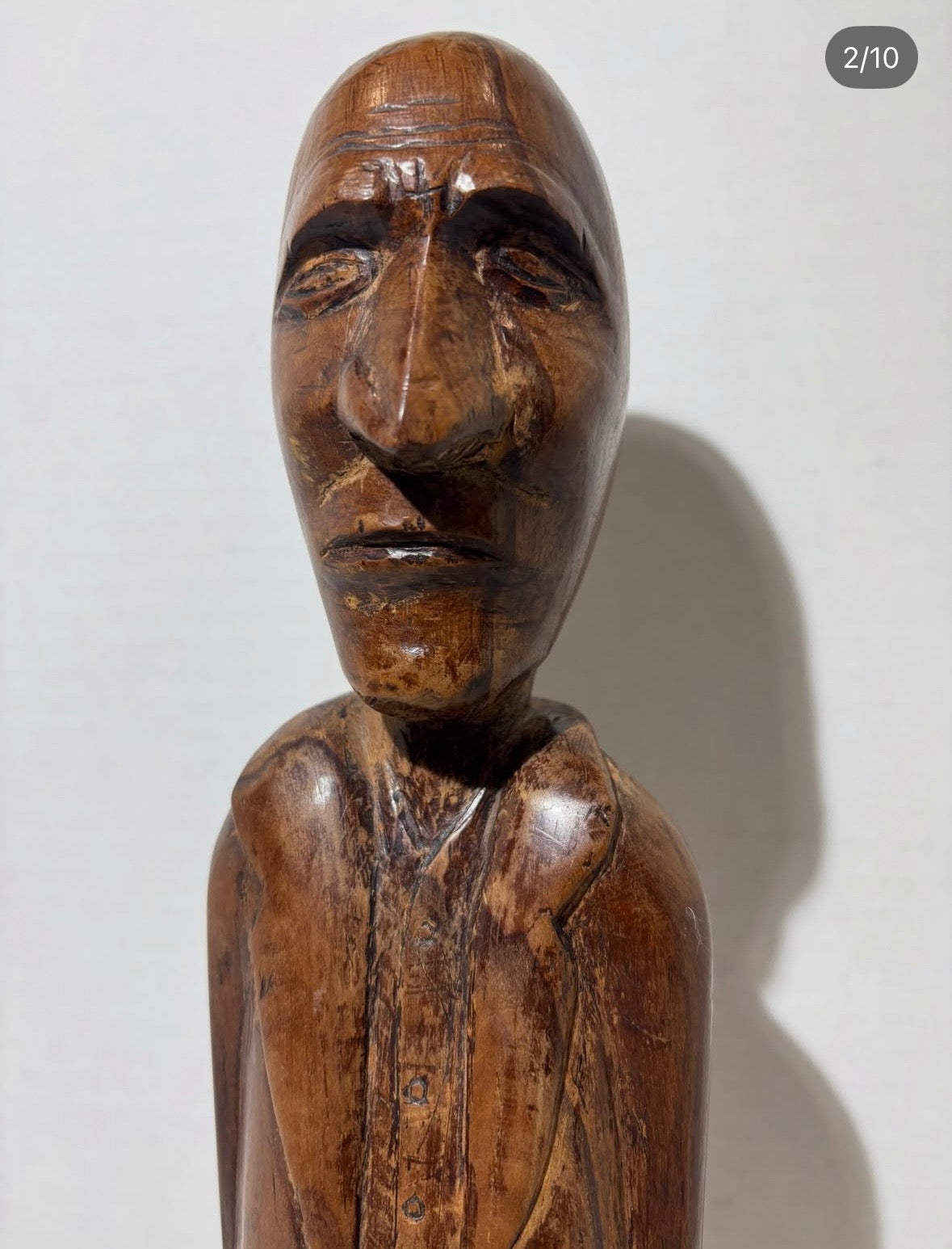 Remarkably Expressive Jamaican Folk Art Carving of a Stern-Faced Gentleman with Hands in His Pockets