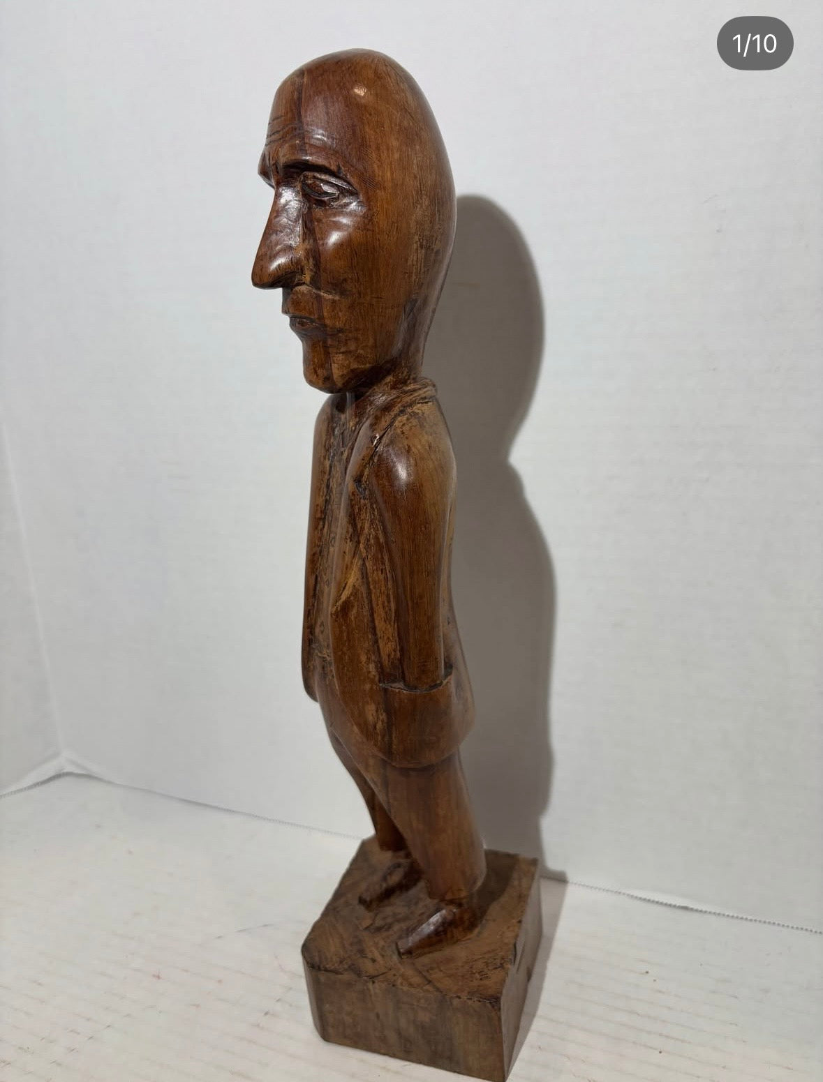 Remarkably Expressive Jamaican Folk Art Carving of a Stern-Faced Gentleman with Hands in His Pockets