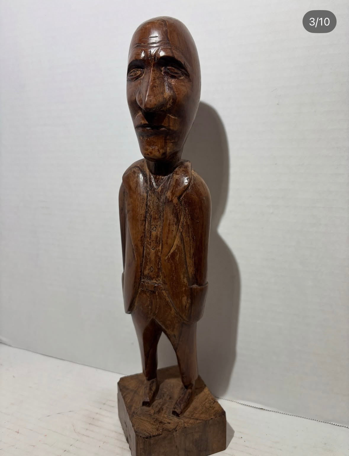 Remarkably Expressive Jamaican Folk Art Carving of a Stern-Faced Gentleman with Hands in His Pockets