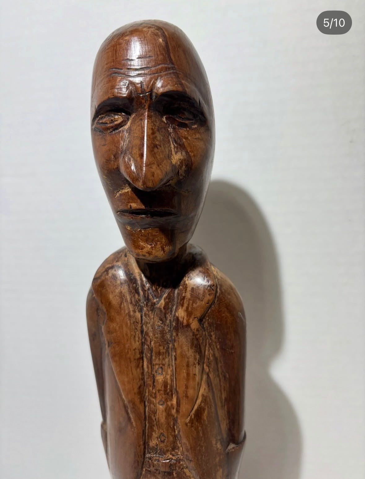 Remarkably Expressive Jamaican Folk Art Carving of a Stern-Faced Gentleman with Hands in His Pockets