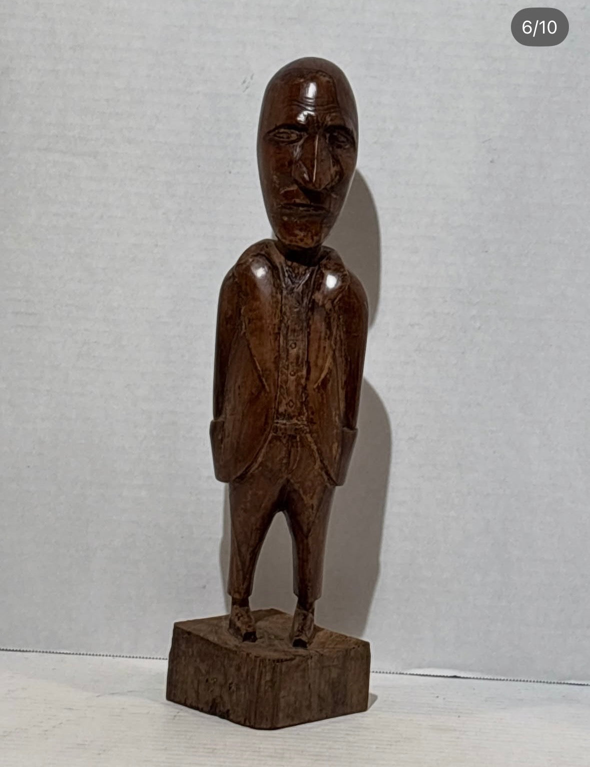 Remarkably Expressive Jamaican Folk Art Carving of a Stern-Faced Gentleman with Hands in His Pockets