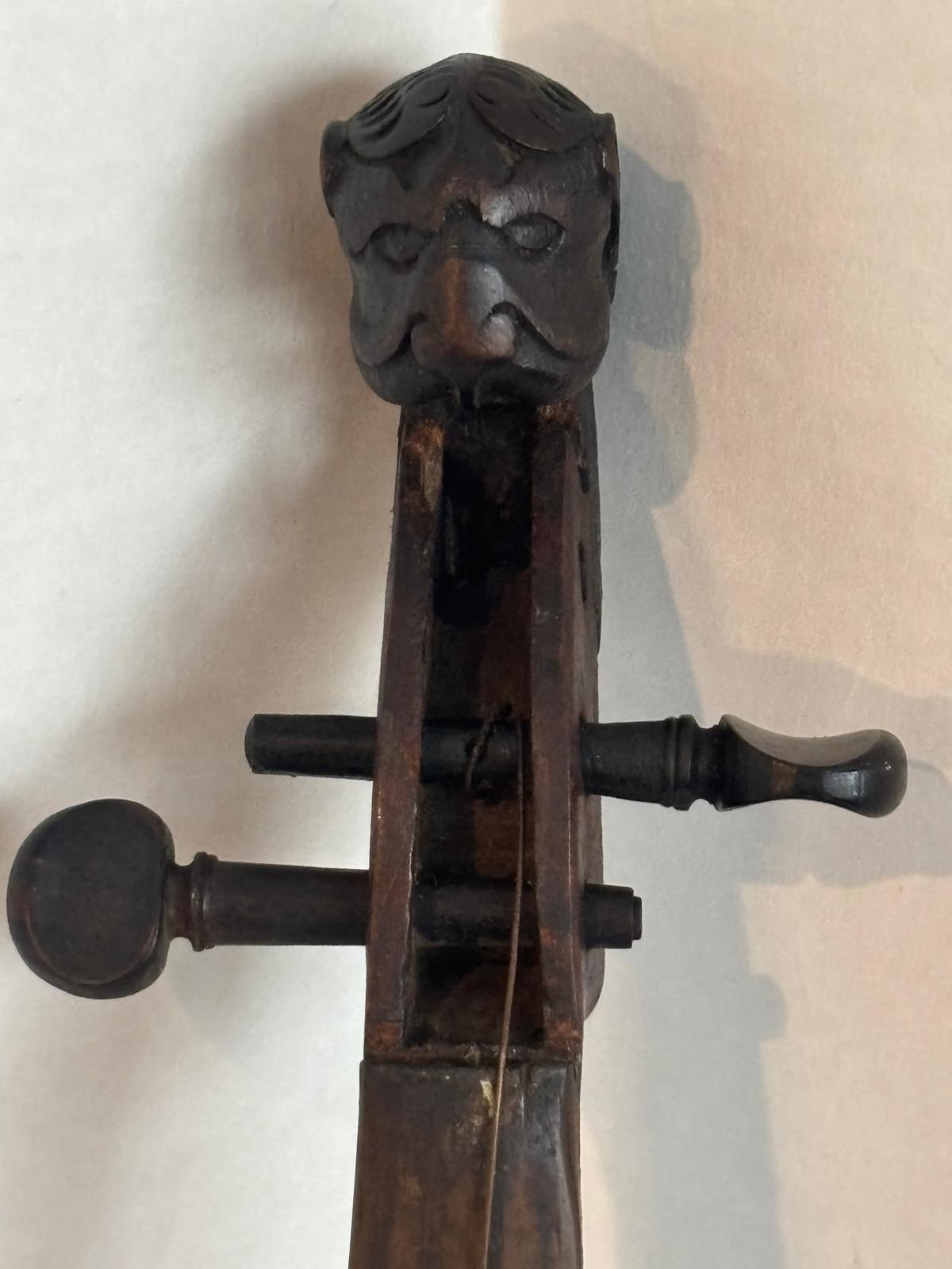 Patriotic Lion-Head Violin with Hand-Painted American Eagle, in Original Coffin Case Inscribed “James Tucker” , likely made in Germany, exported to the U.S mid-19th century