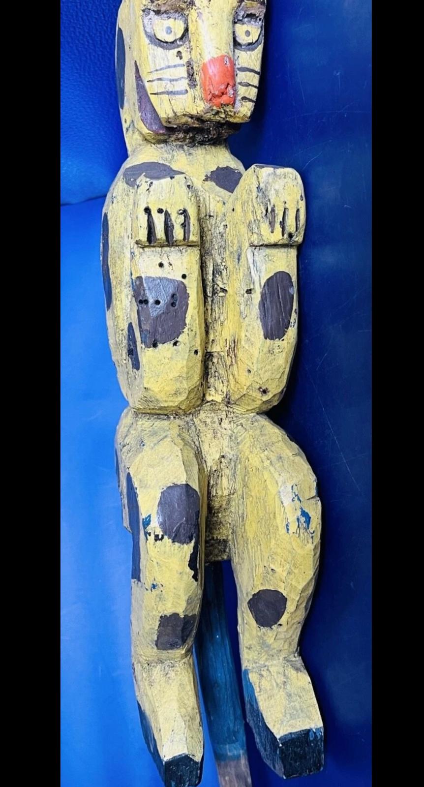 Carved and Painted Yellow Cat Pole Figure