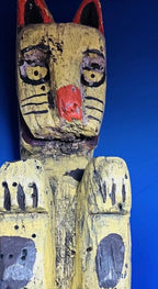 Carved and Painted Yellow Cat Pole Figure
