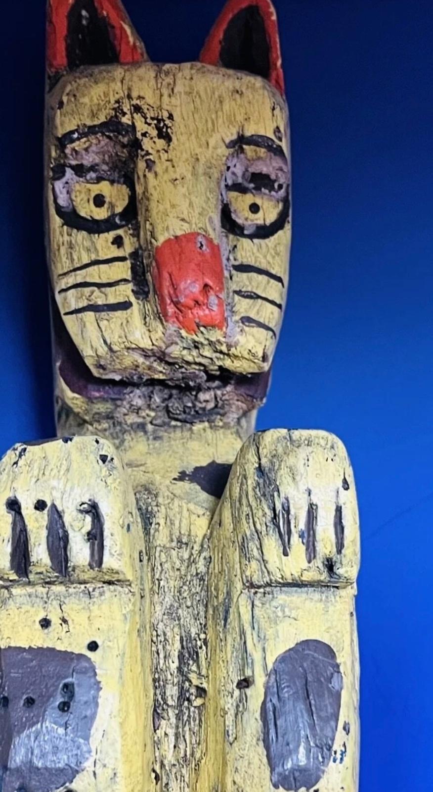Carved and Painted Yellow Cat Pole Figure