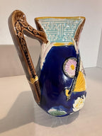 ENGLISH MAJOLICA PITCHER IN THE JAPONESQUE TASTE — ATTRIBUTED TO COPELAND & SONS (MINTON TRADITION), CIRCA 1875–1890