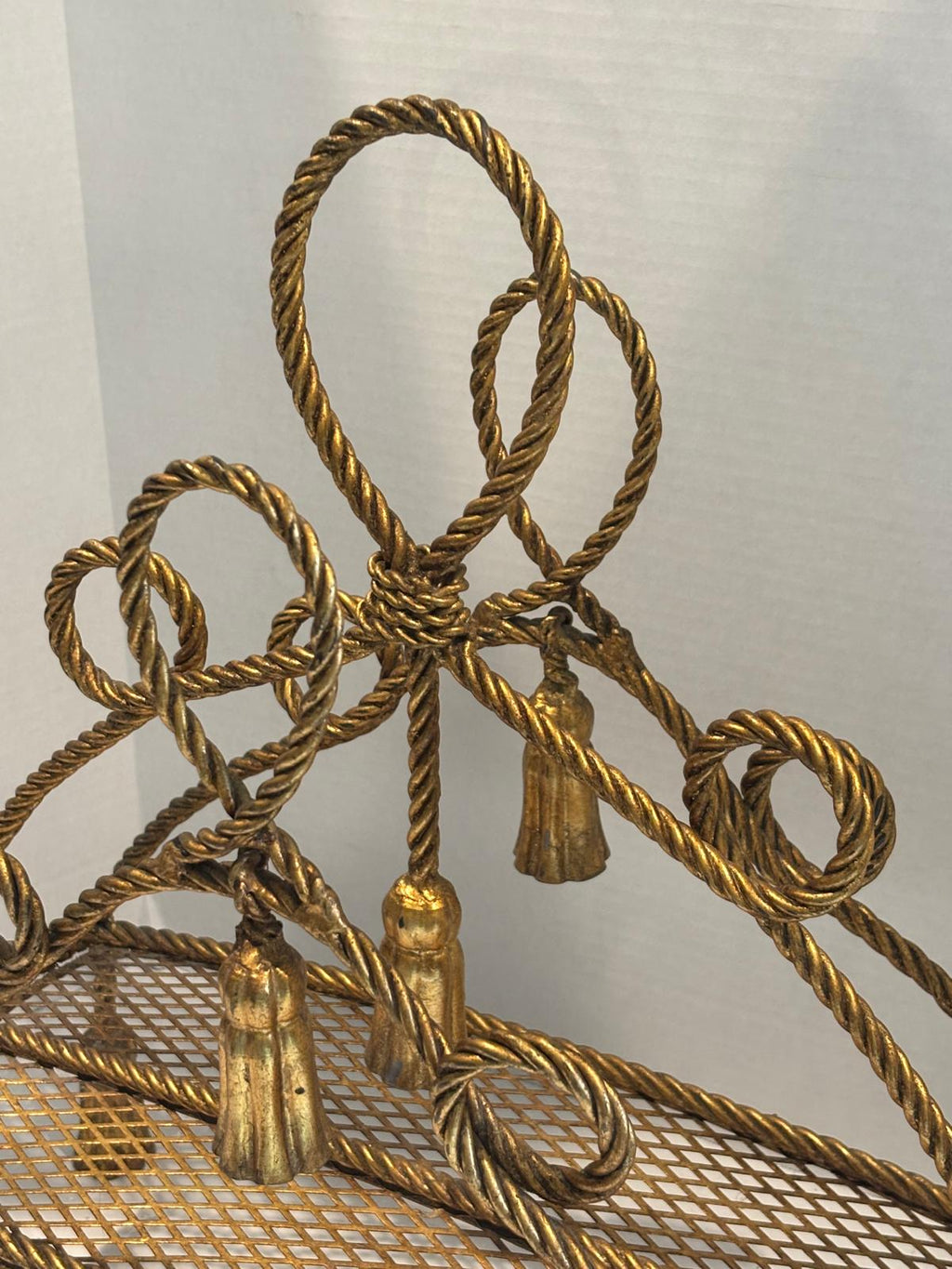 Sculptural Hollywood Regency Rope-Work Magazine Rack with Tassel Ornament, c. 1930s