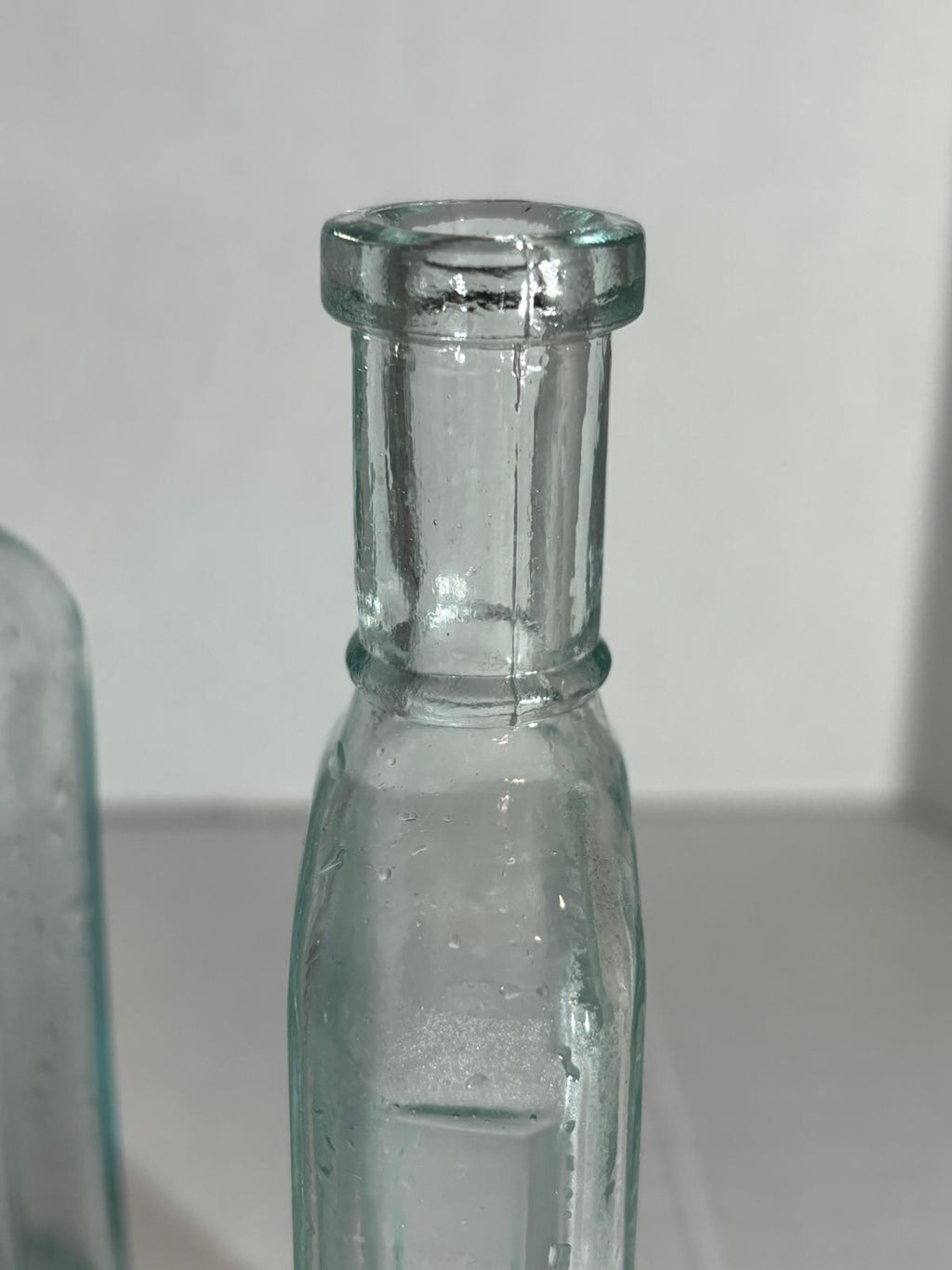 Group of Six Burnett’s Standard Flavoring Extract Bottles, Boston, Late 19th Century
