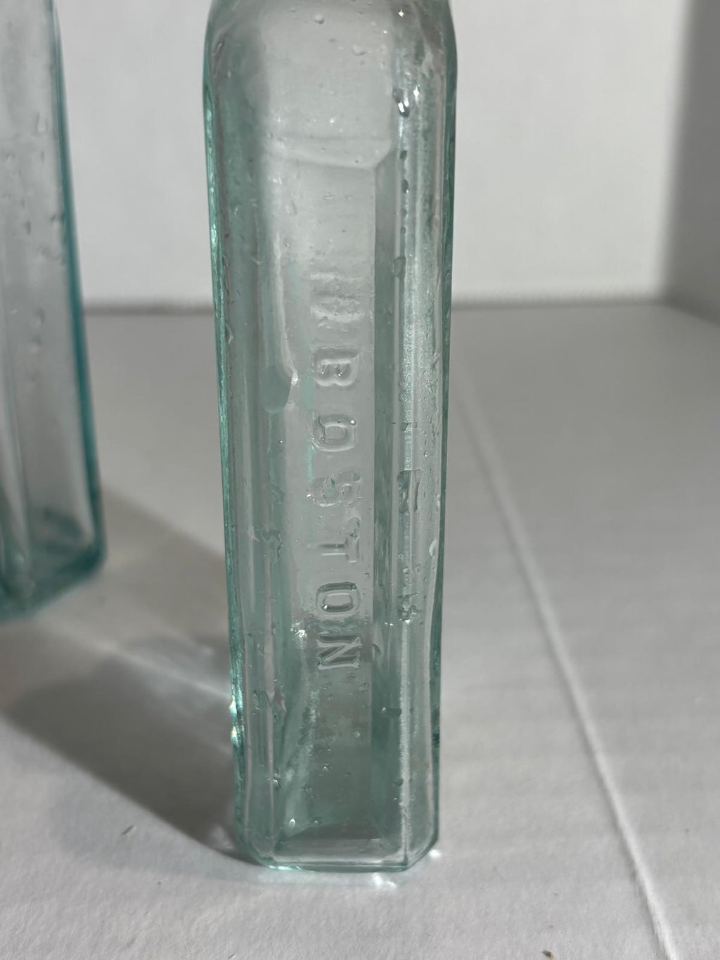 Group of Six Burnett’s Standard Flavoring Extract Bottles, Boston, Late 19th Century