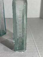 Group of Six Burnett’s Standard Flavoring Extract Bottles, Boston, Late 19th Century