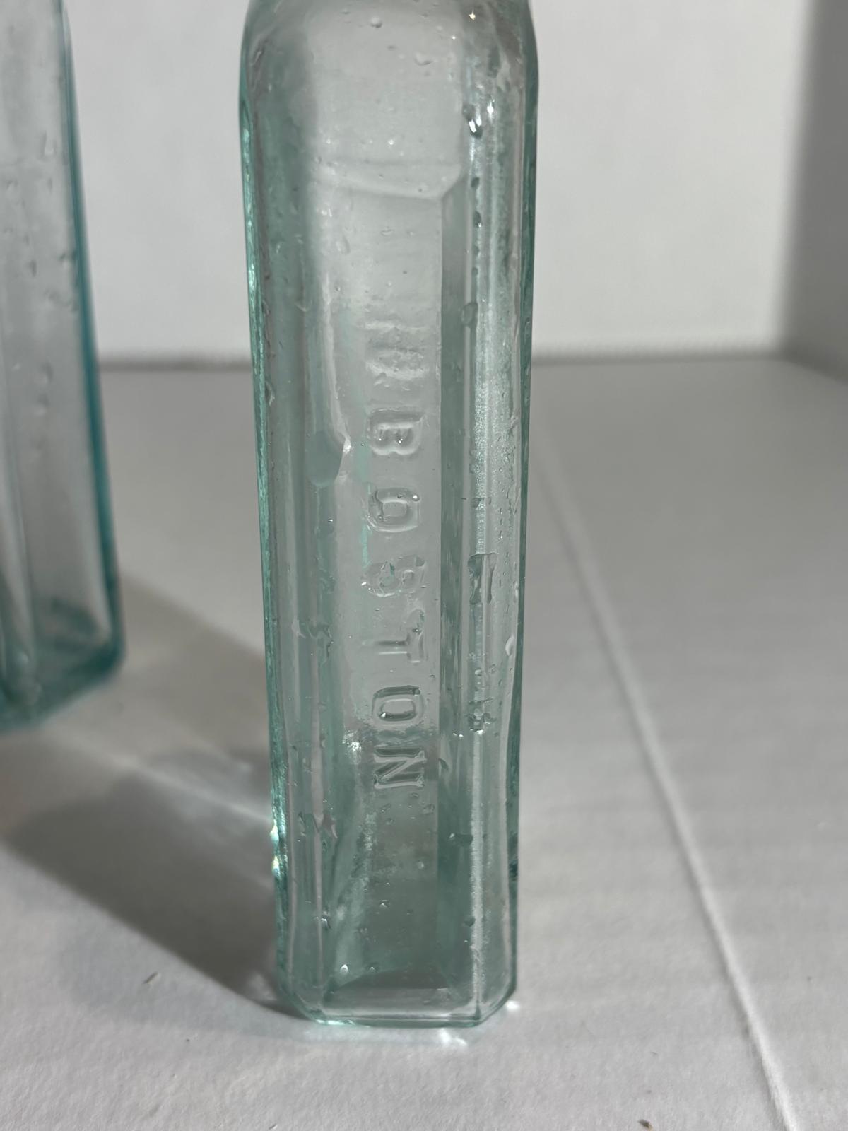 Group of Six Burnett’s Standard Flavoring Extract Bottles, Boston, Late 19th Century