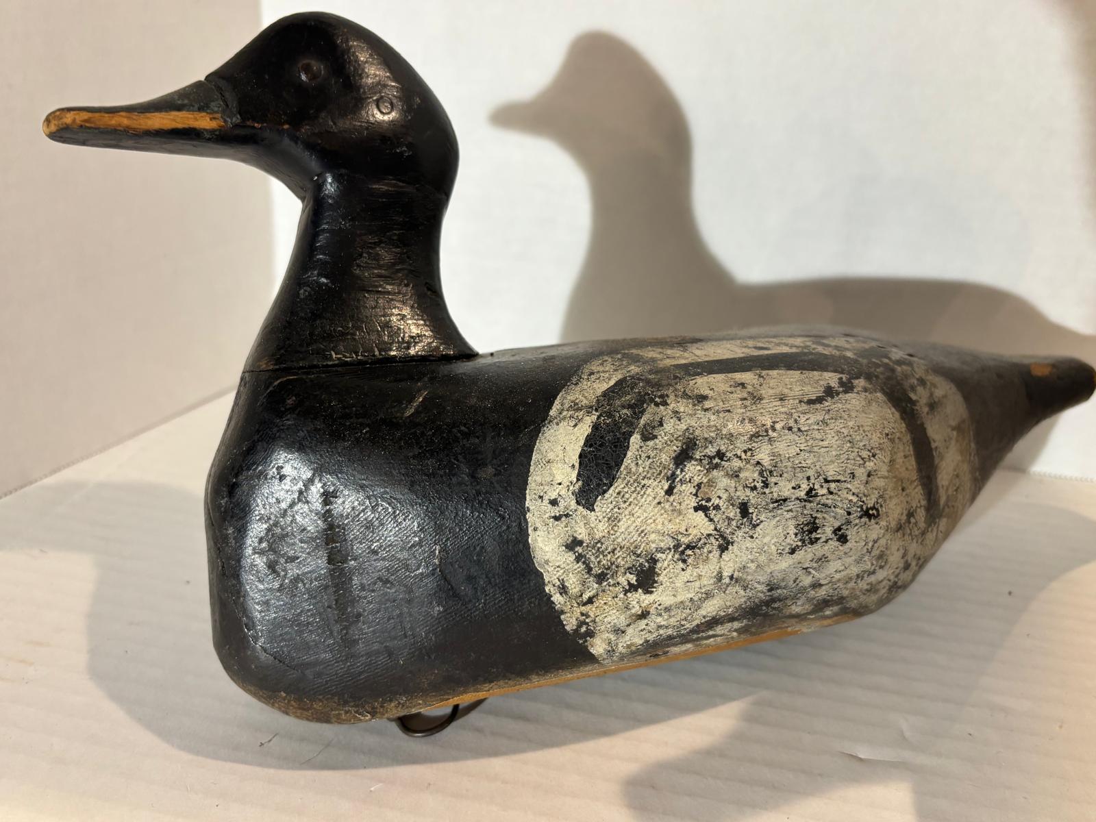 Important Pair of Early Working Merganser Decoys Circa 1910–1930.
