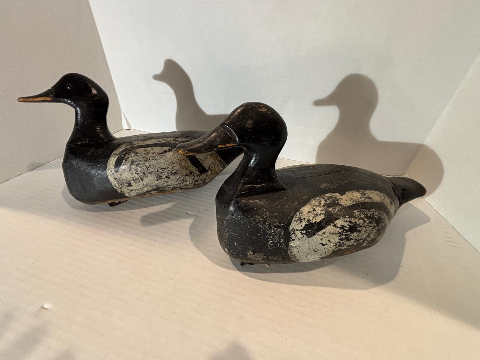 Important Pair of Early Working Merganser Decoys Circa 1910–1930.