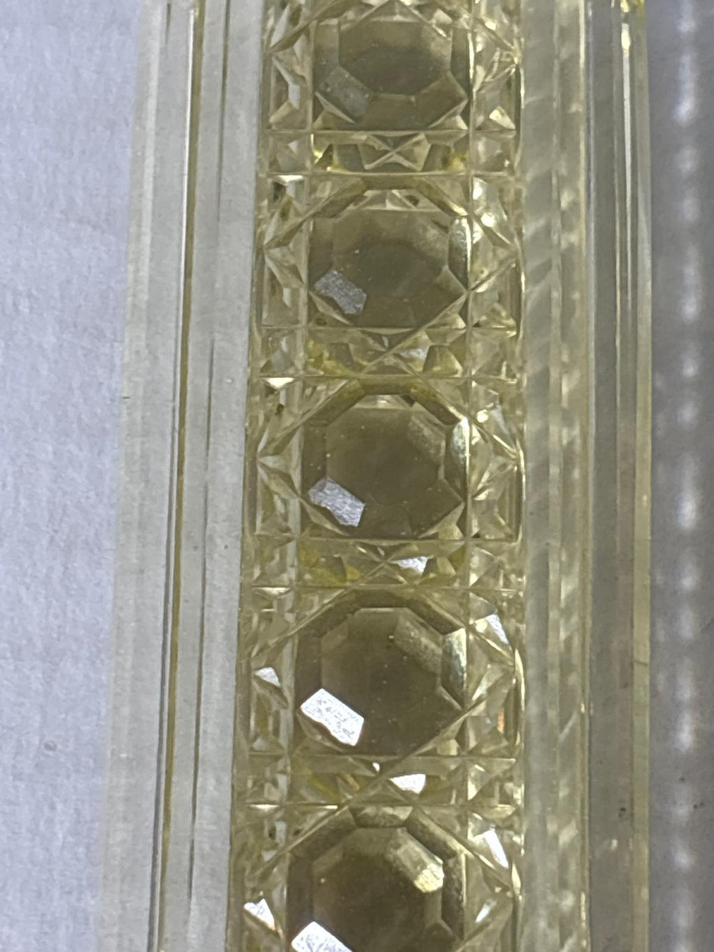 IMPORTANT ART DECO ARCHITECTURAL PERFUME BOTTLE IN URANIUM-TINTED GLASS Circa 1928–1935