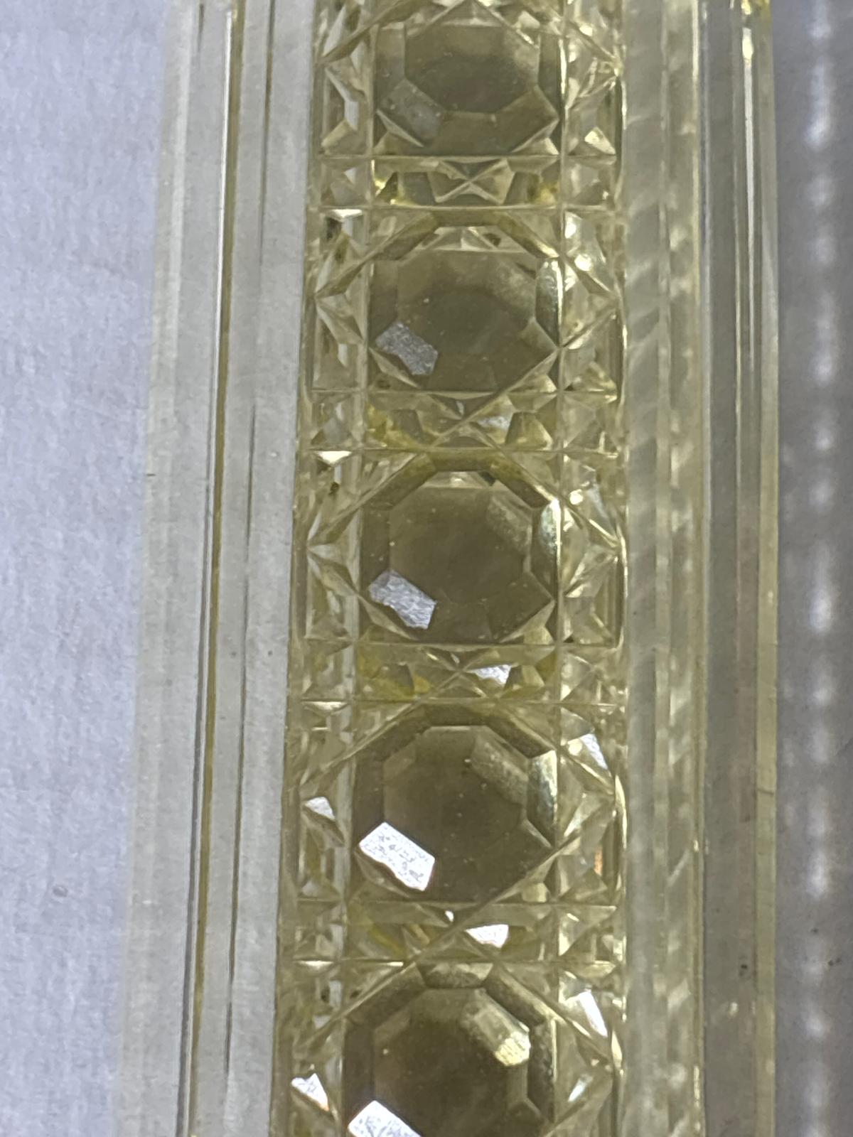 IMPORTANT ART DECO ARCHITECTURAL PERFUME BOTTLE IN URANIUM-TINTED GLASS Circa 1928–1935