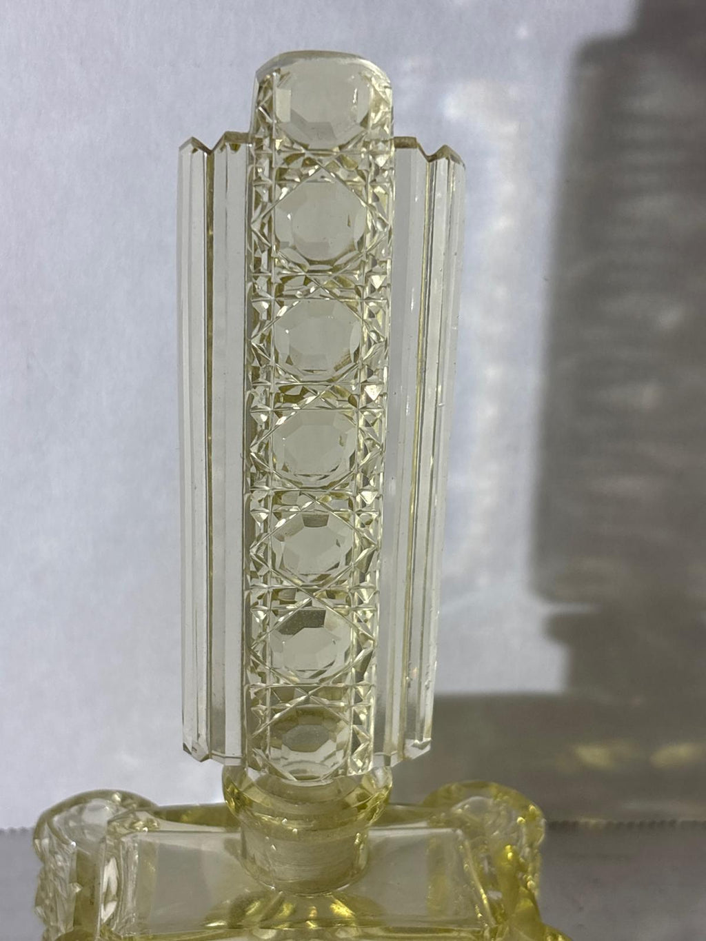 IMPORTANT ART DECO ARCHITECTURAL PERFUME BOTTLE IN URANIUM-TINTED GLASS Circa 1928–1935
