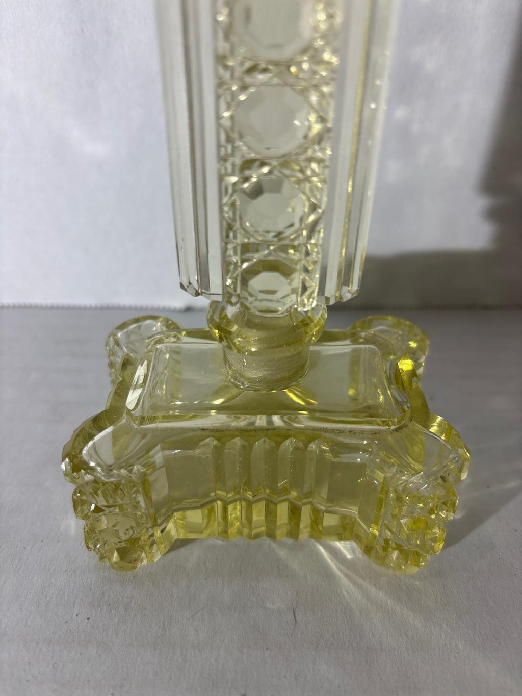 IMPORTANT ART DECO ARCHITECTURAL PERFUME BOTTLE IN URANIUM-TINTED GLASS Circa 1928–1935