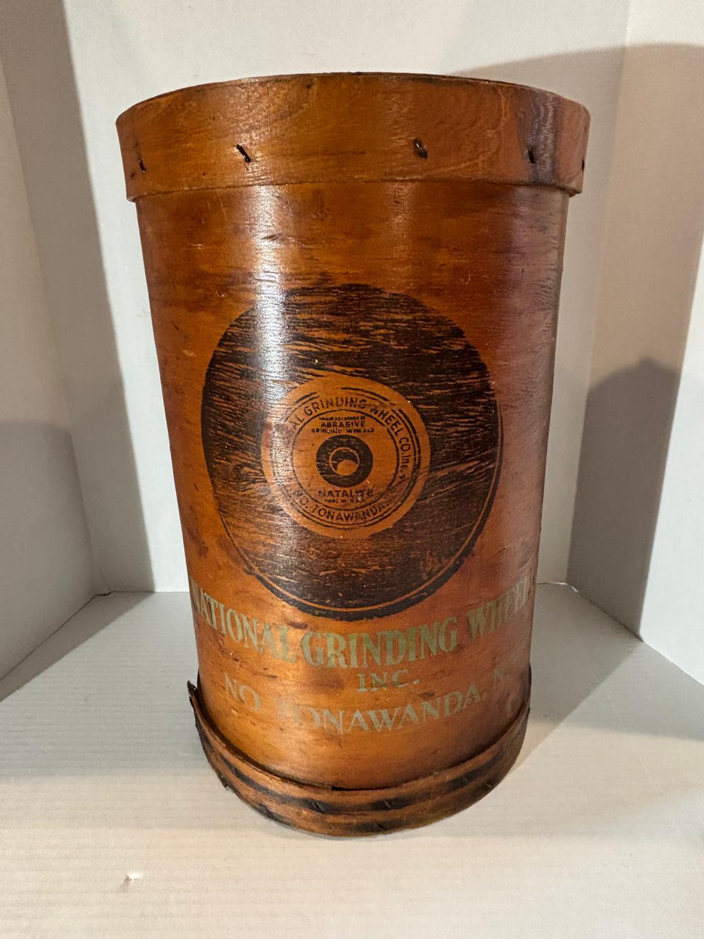 Early 20th century industrial advertising storage container for the National Grinding Wheel Co. of Tonawanda, New York.